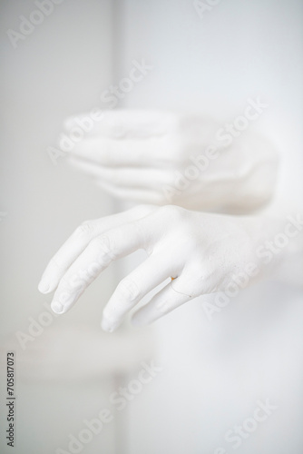 White plaster hands. 