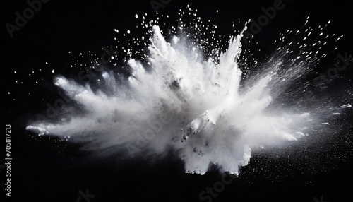 white powder explosion on black background photo