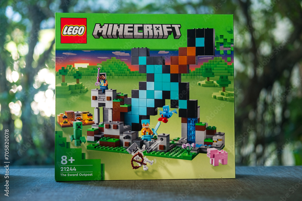 Obraz premium Bangkok, Thailand - January 9, 2024 : A green box of LEGO Minecraft The Sword Outpost 21244. Characters of the game Minecraft. LEGO is a Danish toy production company based
