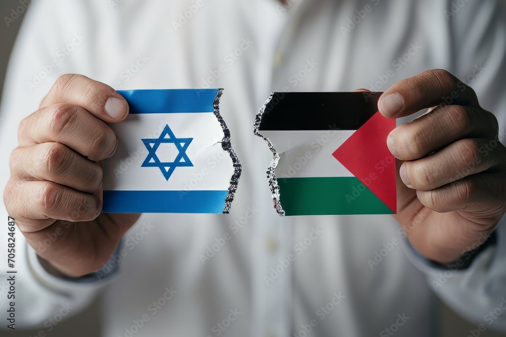 Torn Flags of Israel and Palestine in Hands.
Hands holding torn pieces of Israeli and Palestinian flags. Torn Flags of Israel and Palestine in Hands.
Hands holding torn pieces of Israeli and Palestinian flags.