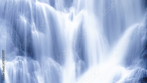 Long exposure shot of cascade waterfalls detail, white toned image with beautiful and dreamy scenes, natural background, Close up.
