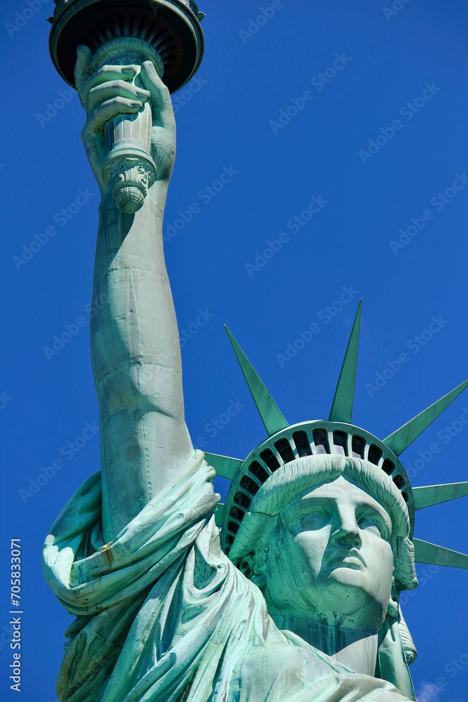 Fototapeta premium Details of The Statue of Liberty (Liberty Enlightening the World), the amazing copper statue built by Gustave Eiffel in 1886 in New York City.