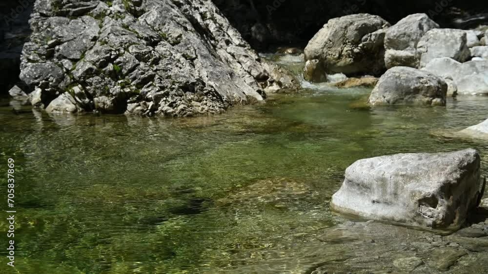 Pond of a stony mountain stream with clean water Pond of a stony mountain stream with clean water