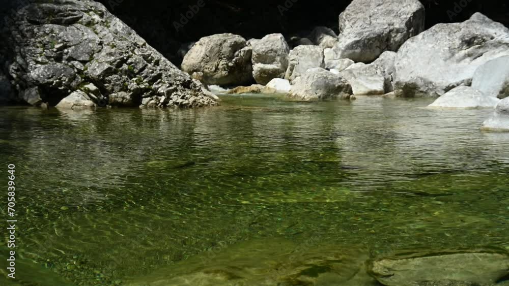 Pond of a stony mountain stream with clean water Pond of a stony mountain stream with clean water