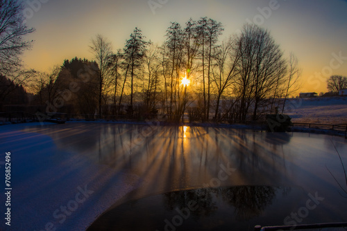 Sonnenaufgang am Teich © Michael