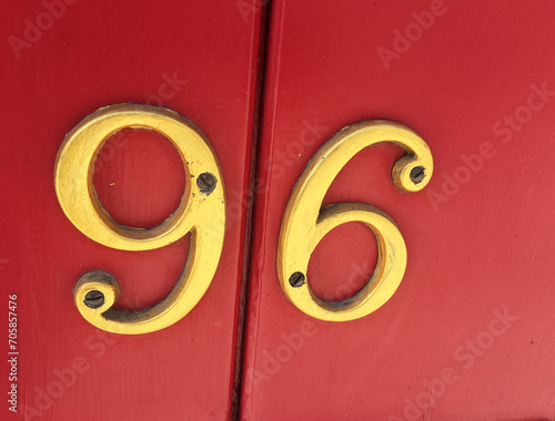 Close up of an house door number 96