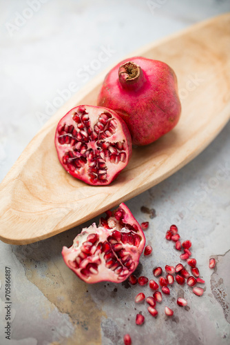 Bright fresh pomegranate photographed in studio. 