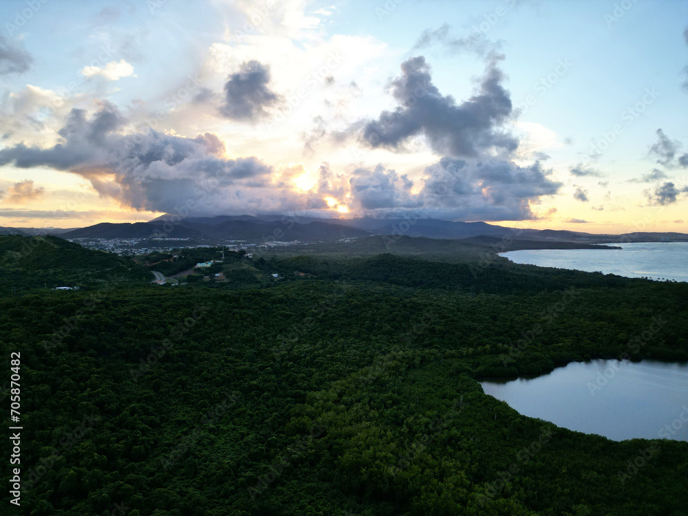 el yunque rainforest view at sunset from fajardo puerto rico coastline beach (caribbean travel tourism destination) seven seas beach, golden hour dusk, bay, lake, lagoon, bioluminescent bay