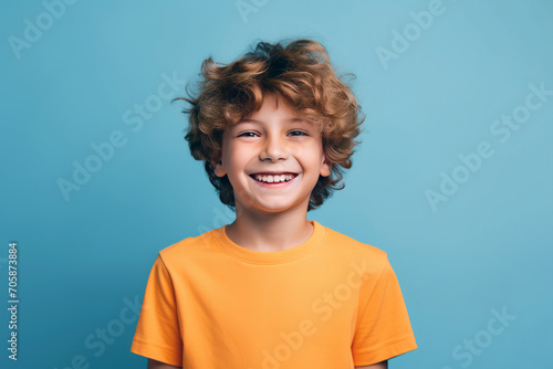Caucasian smiling boy studio portrait, simple background. AI gen