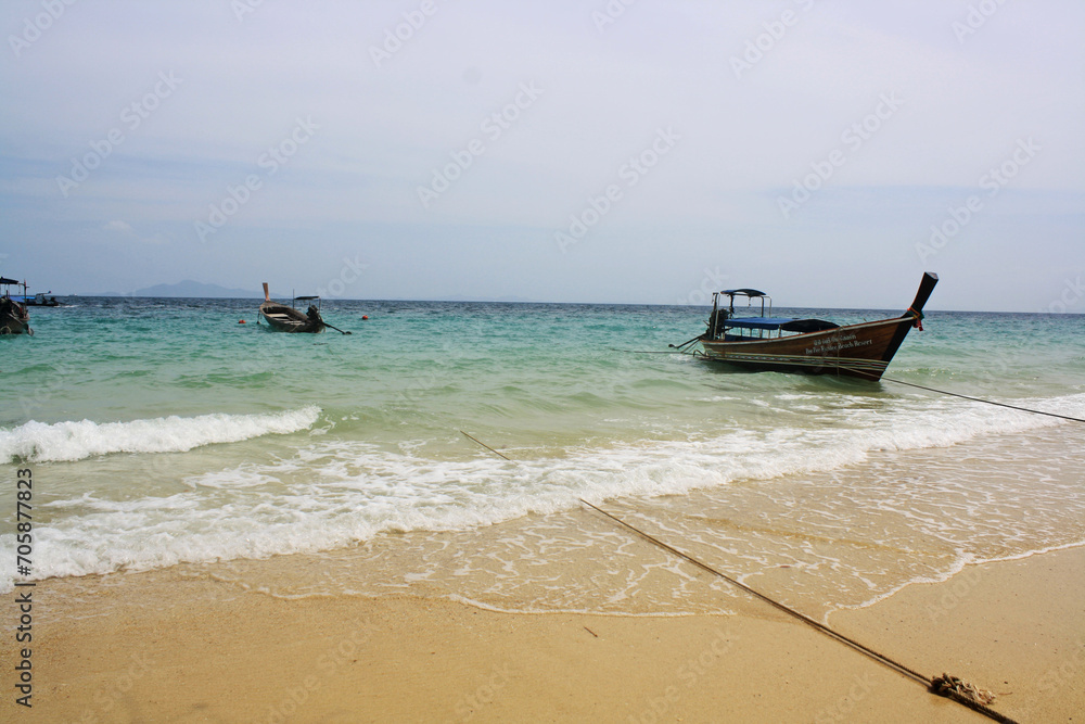 Beautiful boats on the sandy beach. Thailand.
