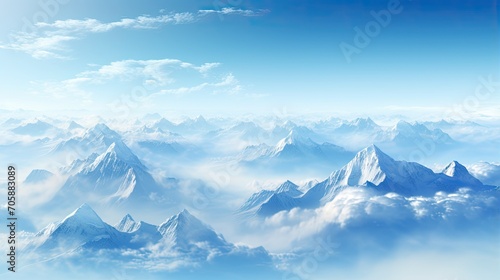 Mountain range with visible silhouettes through the morning colorful fog. Hazy mountain sunset. Panoramic view. Snowy desert terrain on a sunny day. Illustration for cover, card, interior design, etc. © Login