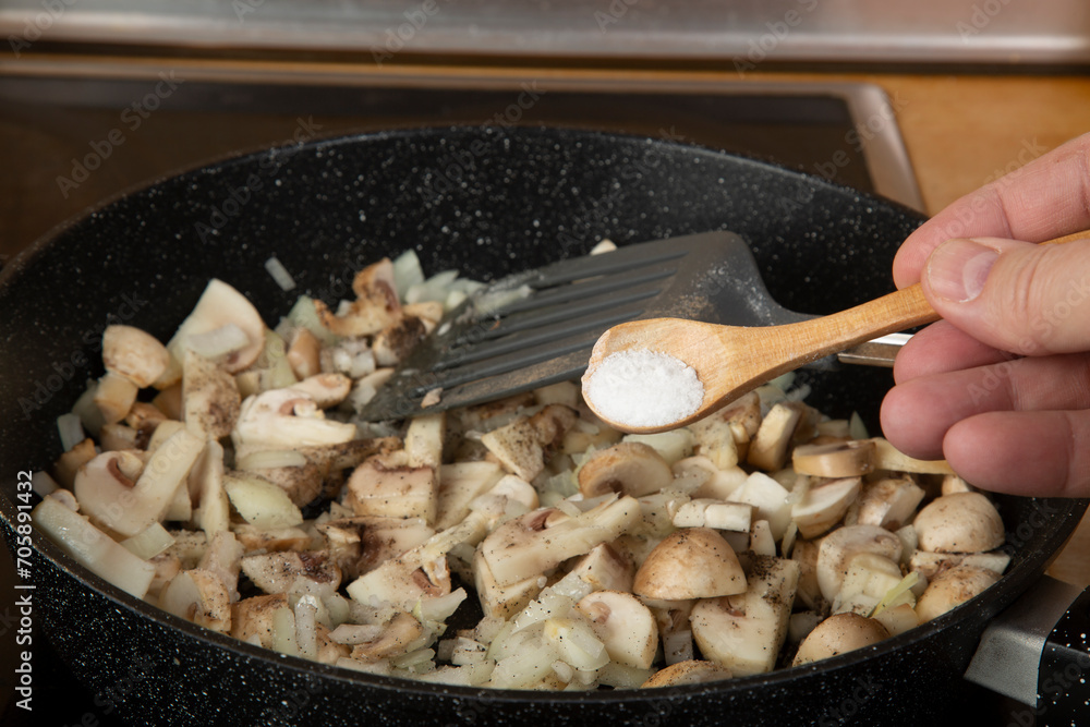 Cooking mushrooms with eggs and onions. Cooking at home. A series of photos. Cooking mushrooms with eggs and onions. Cooking at home. A series of photos.