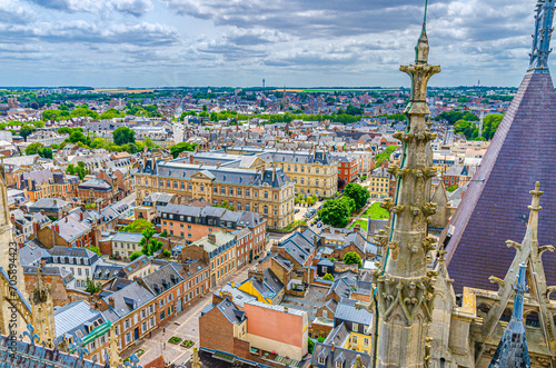 Aerial view from top of Amiens Cathedral with fleche spire and panorama of Amiens old historical city centre and outskirts districts, Somme department, Hauts-de-France Region, Northern France