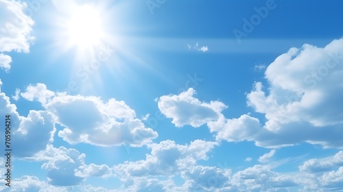 Bright sun shining through the clouds on a sunny day photo