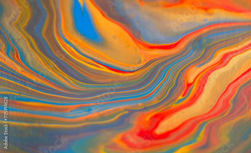 Fluid art painting. Abstract decorative marble texture. Background with liquid acrylic. Mixed paints for poster or wallpaper. Modern art. Psychedelic colors. Blue, golden, red, yellow, orange. 