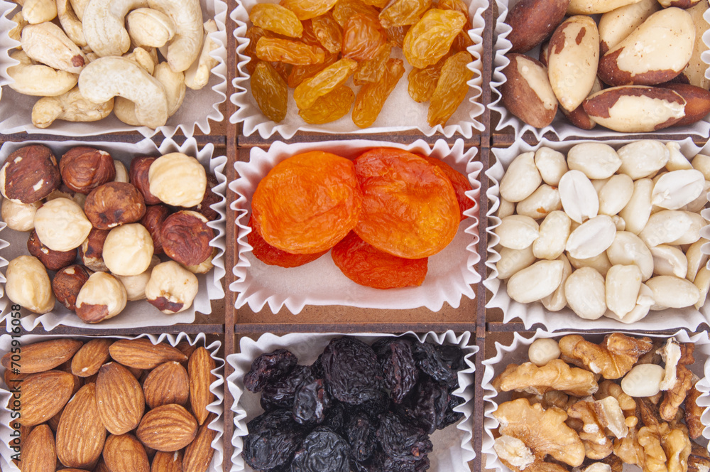 Mix of nuts and dried fruits close up Mix of nuts and dried fruits close up