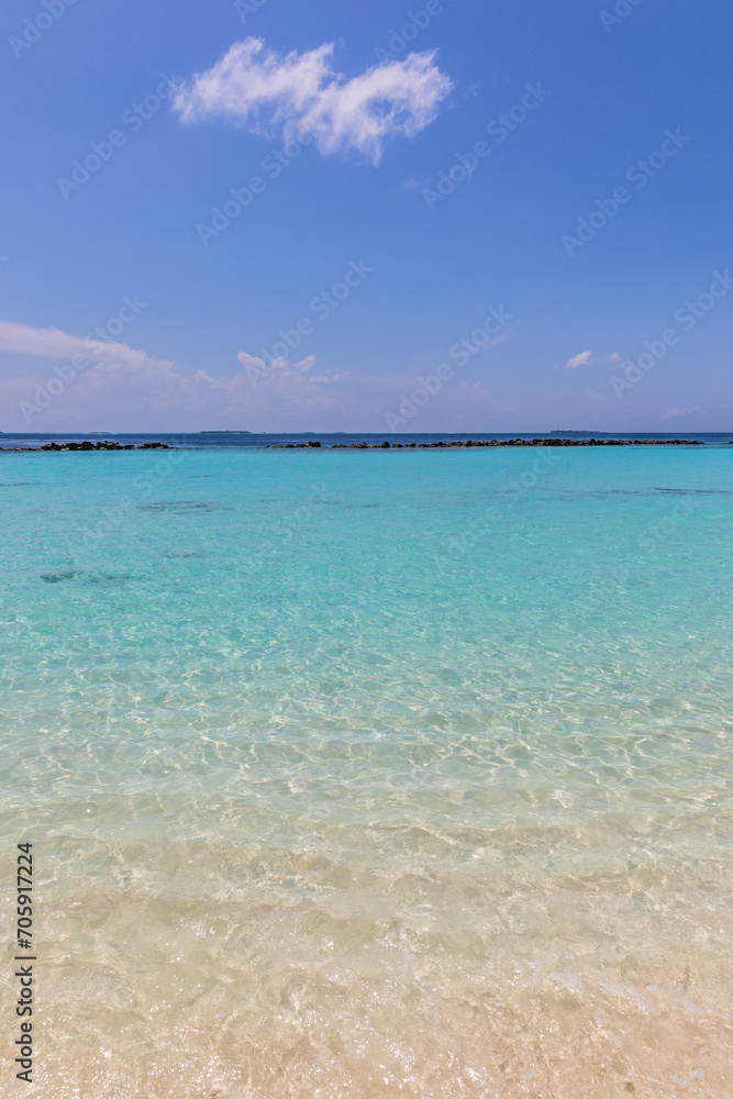 Azure water in the lagoon of the tropical island in the Maldives Azure water in the lagoon of the tropical island in the Maldives