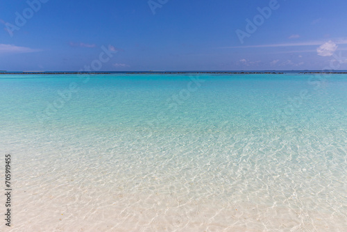 Azure water in the lagoon of the tropical island in the Maldives