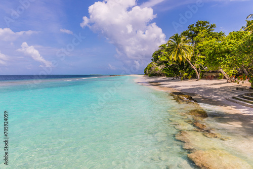 Azure water in the lagoon of the tropical island in the Maldives