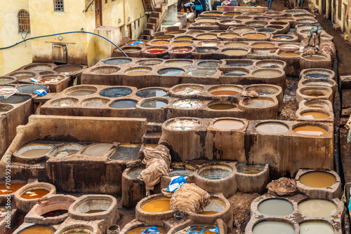 Old tanks of the Fez tanneries with color paint for leather, Morocco. © Michael