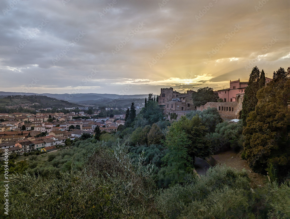 Sunset over the scenic old Tuscan town Certaldo Alto