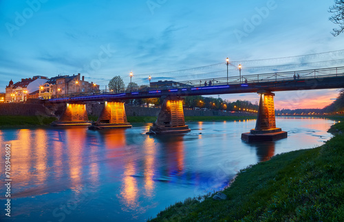 Illuminated pedestrian bridge in the center of Uzhgorod photo