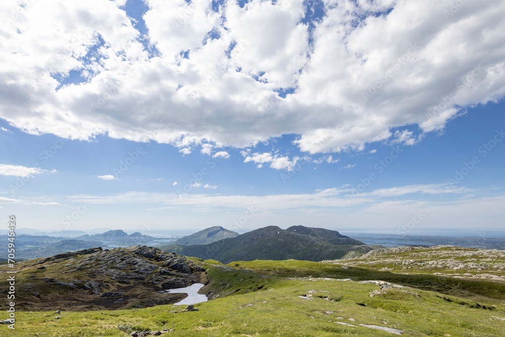 Fototapeta premium Hiker in the mountains,Brønnøy,Helgeland,Norway