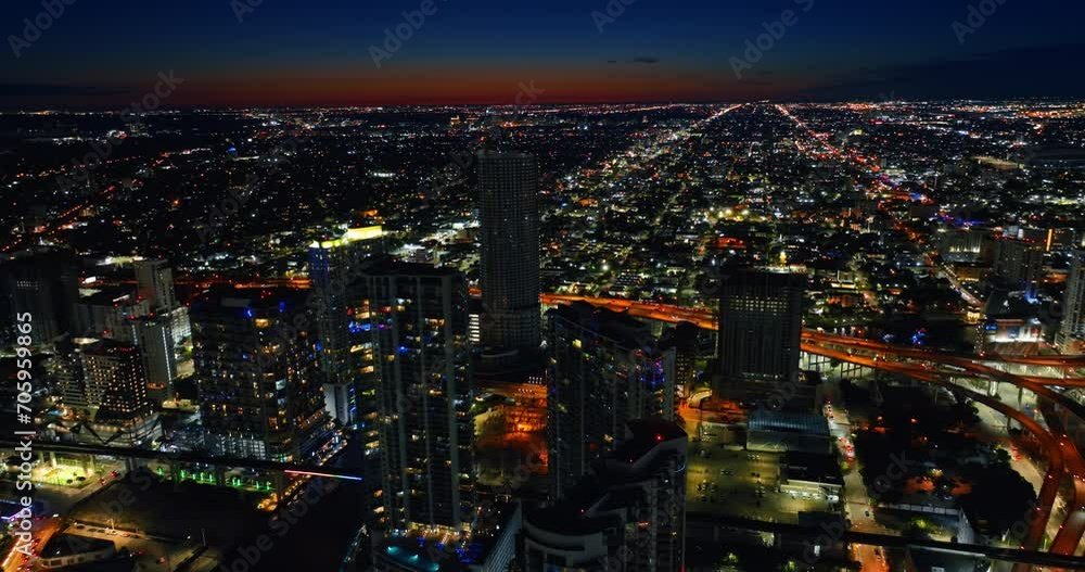 Billions of lights in the panorama of night metropolis. Scenic view of Miami above its downtown. Top perspective. Billions of lights in the panorama of night metropolis. Scenic view of Miami above its downtown. Top perspective.