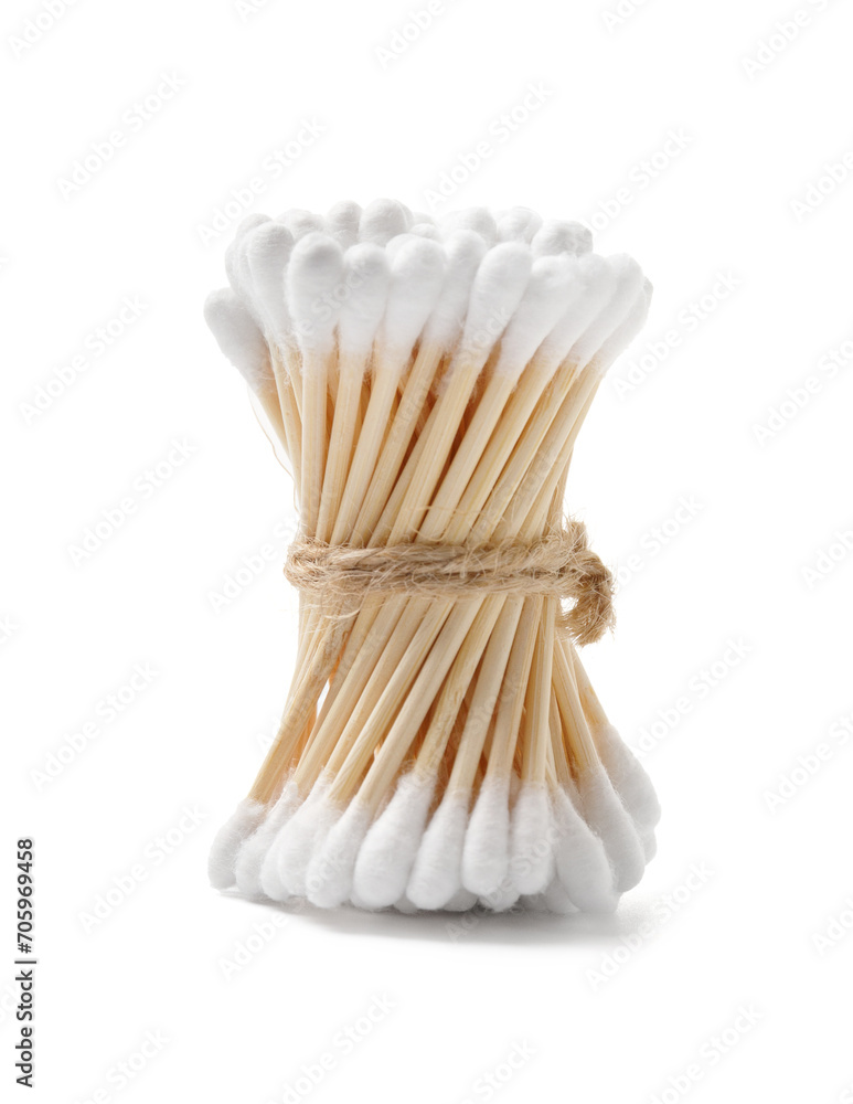 Bunch of wooden cotton swabs buds tied with twine on a white background