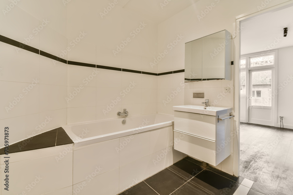 Modern bathroom with bathtub and sink Modern bathroom with bathtub and sink