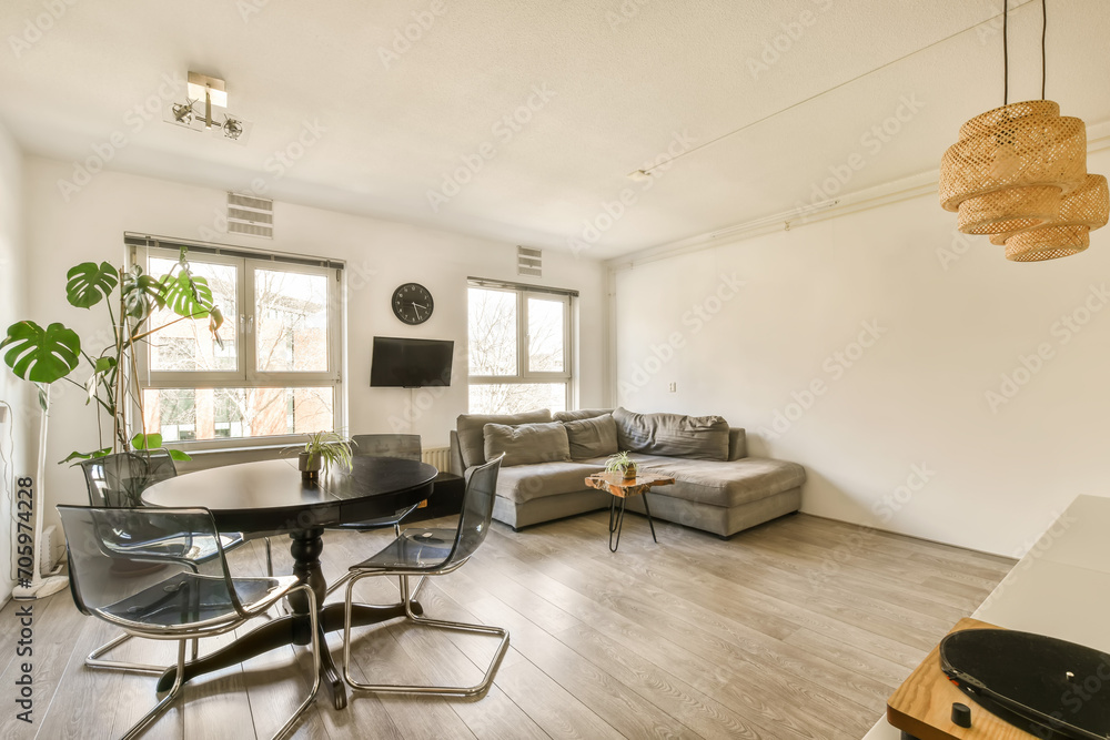 Great room with sofa and dining table Great room with sofa and dining table