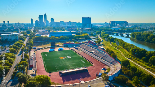 Aerial Urban Stadium with City Skyline and River - Indianapolis photo