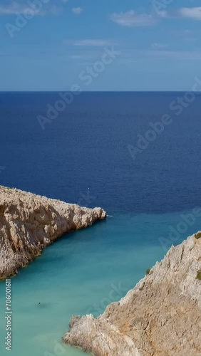 Sunny summer day at Seitan Limania Agiou Stefanou beach near Chania, Crete, Greece. Unique bay, clear sea waters, high cliffs photo