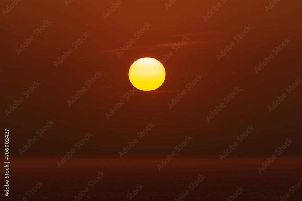 Sunset with sea view and sun in the background on Cartagena beach, Colombia.
​