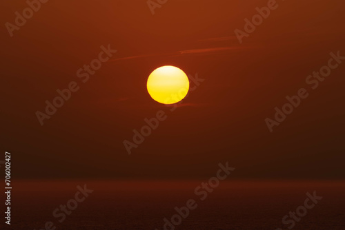 Sunset with sea view and sun in the background on Cartagena beach  Colombia.    