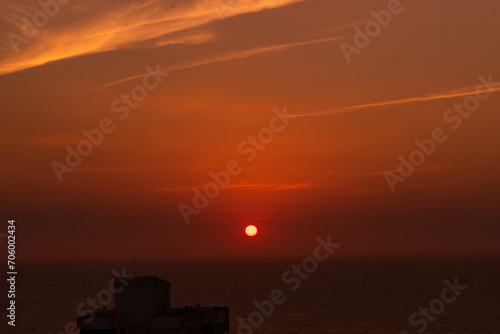 Sunset with sea view and sun in the background on Cartagena beach, Colombia. ​ © Hillary