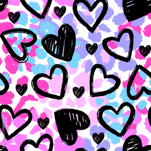 Abstract seamless chaotic leopard print with hearts elements. Grunge texture background. Wallpaper for girls. Fashion style pattern