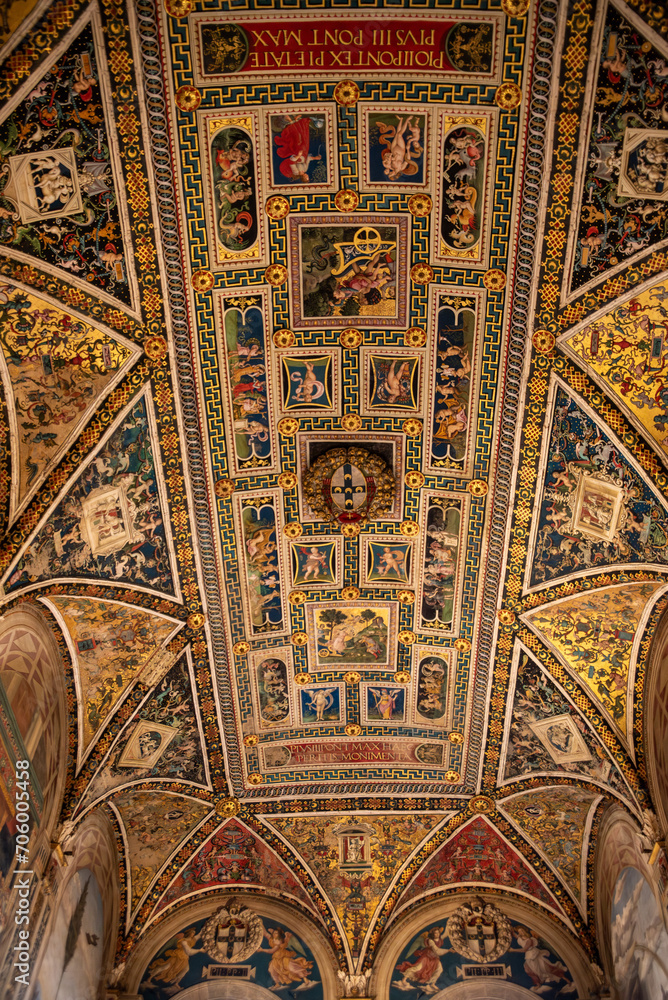 SIENA, ITALY - SEPTEMBER 23, 2023 - Rich ornate famous Piccolomini Library in the Siena cathedral