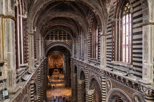 SIENA, ITALY - SEPTEMBER 23, 2023 - View to the nave of the cathedral in Siena, seen from the upper floor photo