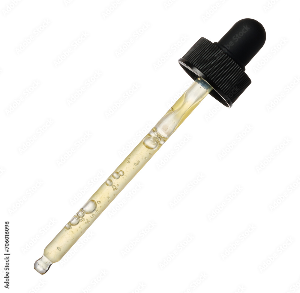 Transparent glass pipette with yellow liquid on isolated background Transparent glass pipette with yellow liquid on isolated background