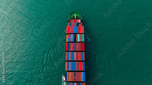 global business transportation, cargo logistic container ship sailing in sea import export goods and distributing products to dealer and consumers worldwide, top view