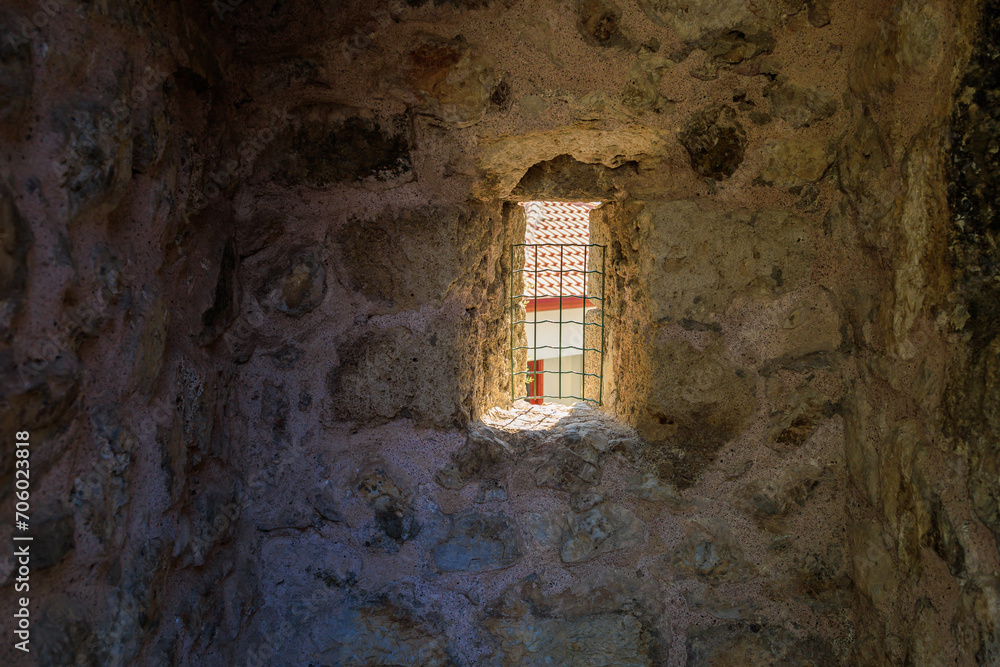 Window in an ancient fortress. Background with selective focus and copy space