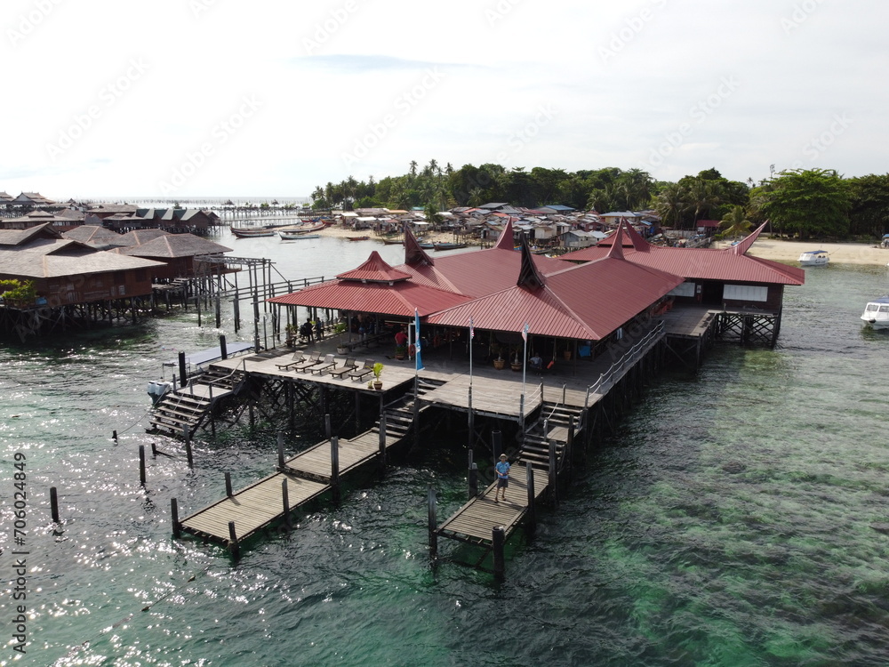 Fototapeta premium Drone view of Mabul Island, the base for diving in Sipadan Island, Sabah state in Malaysia.