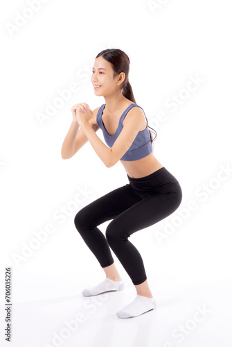Full length portrait beautiful young asian woman in sportswear practicing doing squats for bodybuilder isolated white background, woman workout for strong and strength, sport and endurance concept.