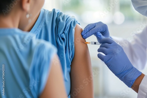 flu vaccination shot in shoulder photo