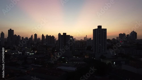 the colors of the sunset between the buildings