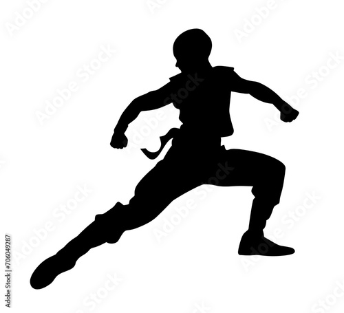 Black silhouette of a Fighter showing kung fu kicks transparent on background.