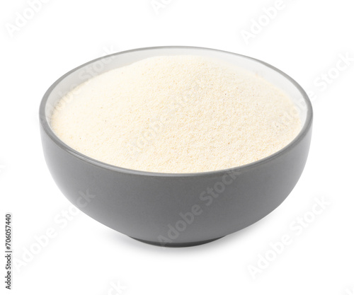 Bowl of uncooked organic semolina isolated on white