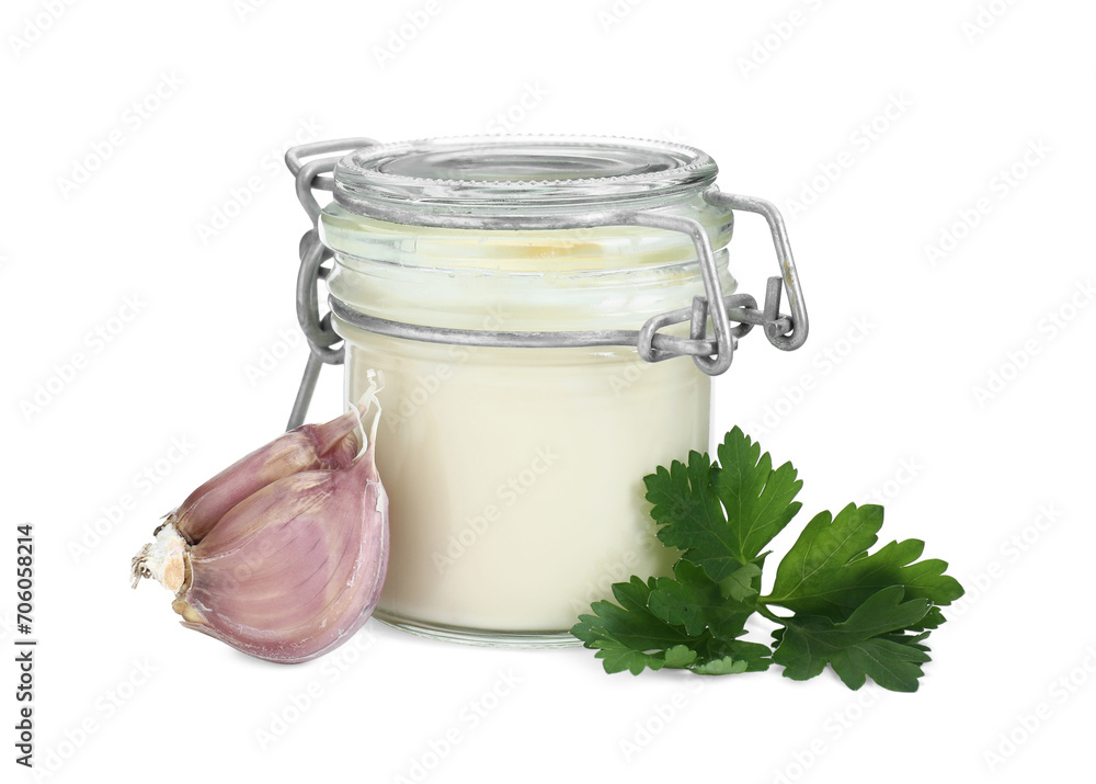 Fresh mayonnaise sauce in glass jar, garlic and parsley isolated on white Fresh mayonnaise sauce in glass jar, garlic and parsley isolated on white