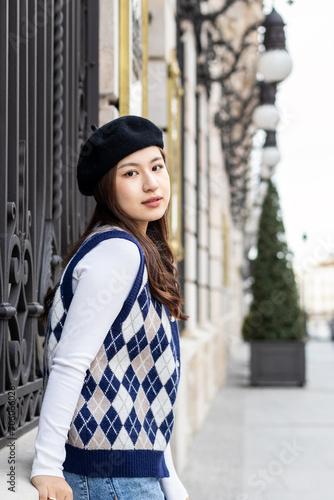 Portrait of a young Asian woman in the city